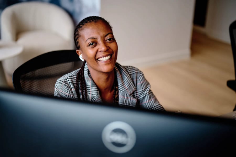 Staff branding photography, working on a laptop, Cape Town