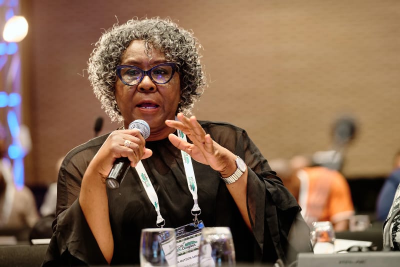 Delegate with microphone asking a question at the AFSTA Congress 2026, Cape Town