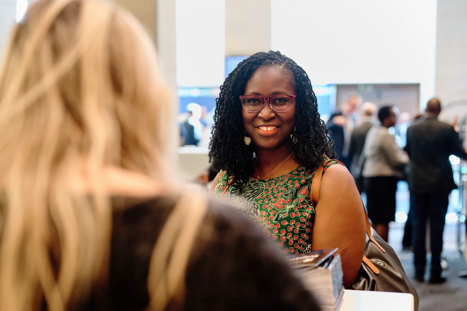 Delegate networking conversation at the ILDS conference, Cape Town