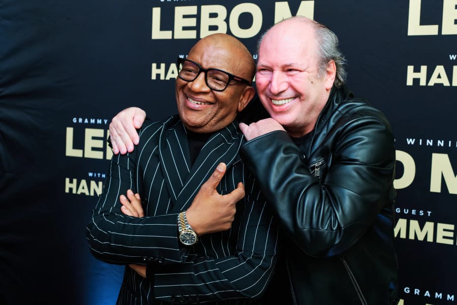 Lebo M and Hans Zimmer arm in arm on the red carpet, Cape Town