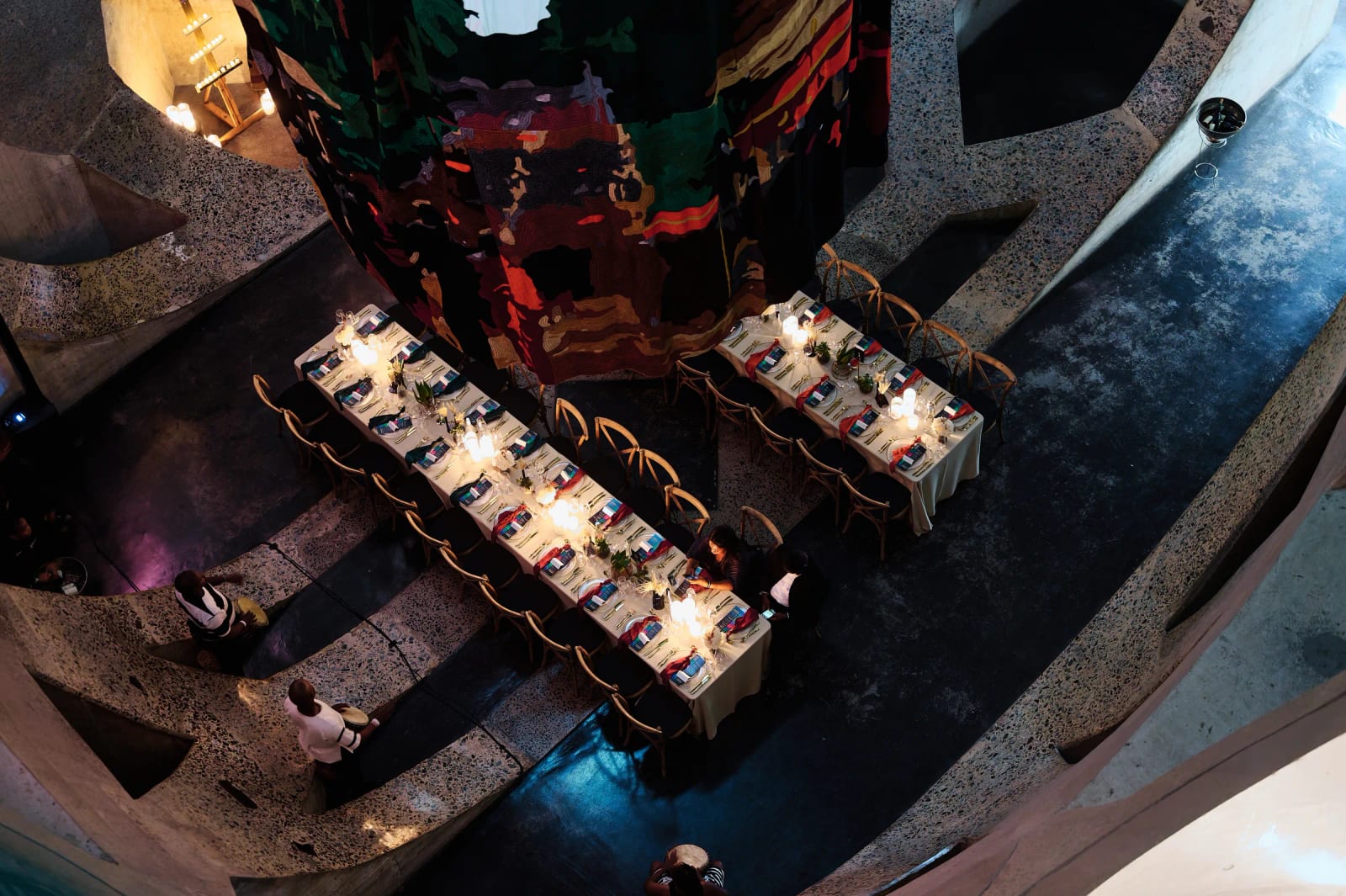Gala dinner tables set among the sculpted concrete of the Zeitz MOCAA atrium, Cape Town