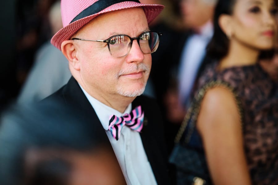 Guest in a pink hat and bow tie during the Zeitz MOCAA gala evening, Cape Town