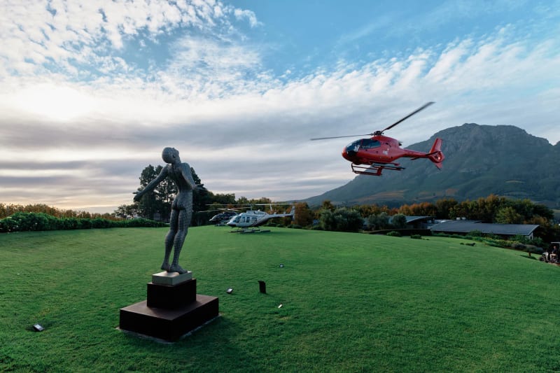 Guest arrival by helicopter at a Cape Winelands estate event