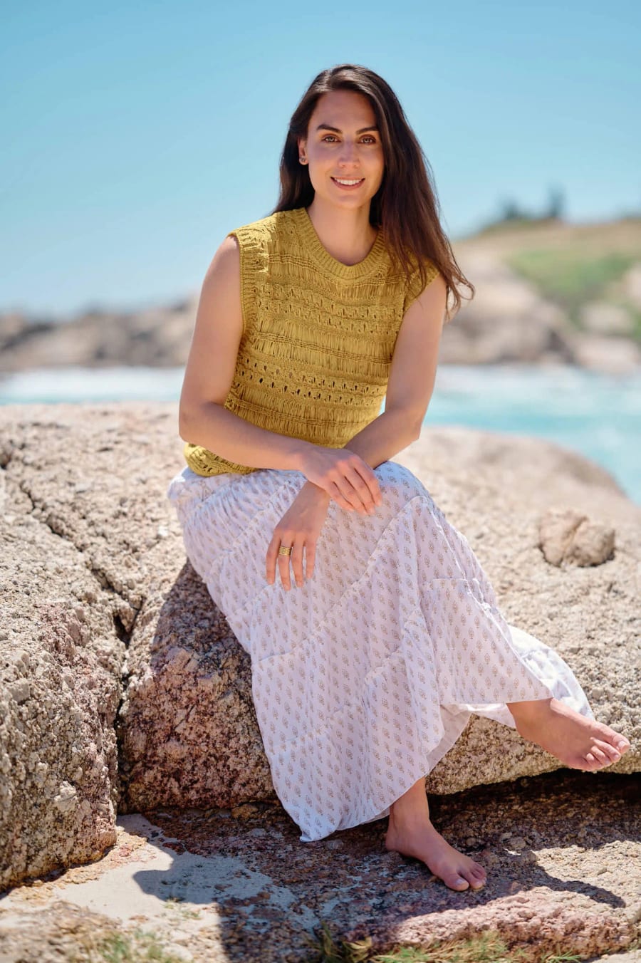 Seated on rocks at the shoreline, Cape Town