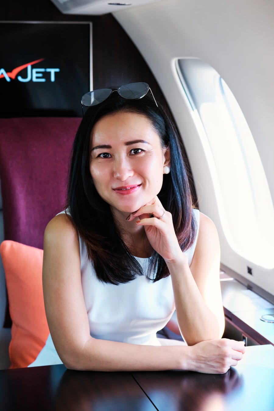 Close portrait at the cabin table of a private jet, Cape Town