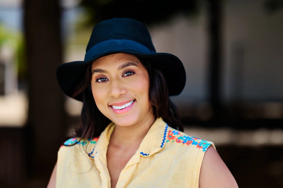 Close portrait in a wide-brimmed sun hat