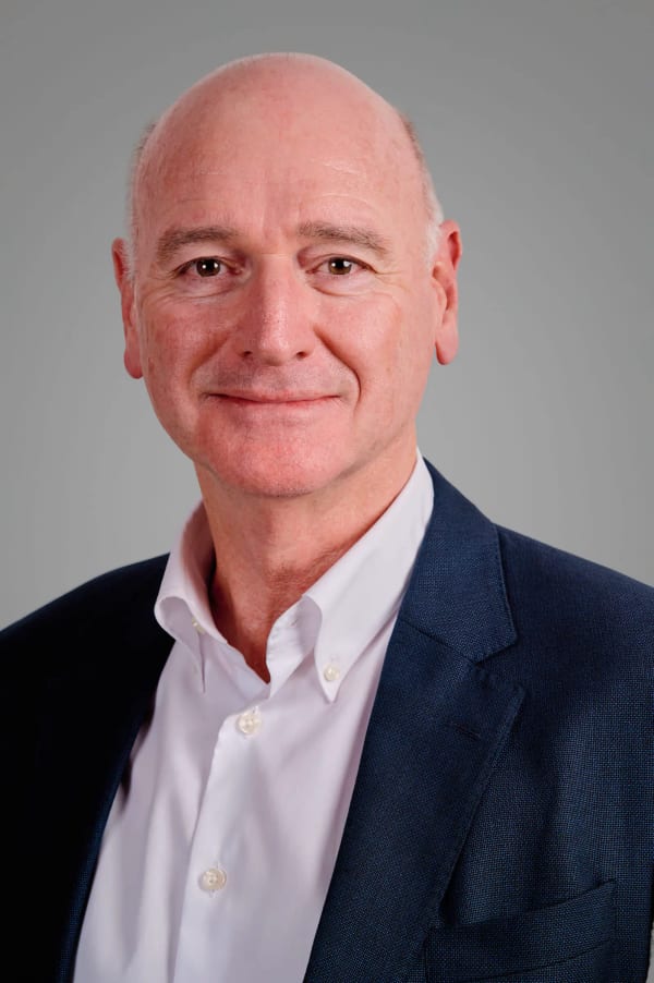 On-location executive headshot photographed at a client office in the Southern Suburbs