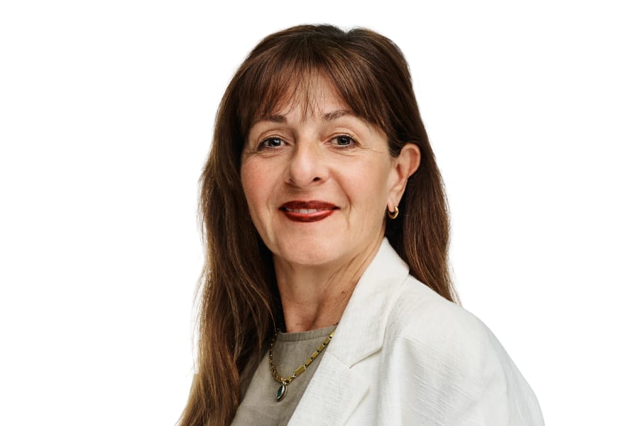 Professional headshot on white, long hair and a cream jacket, Cape Town studio