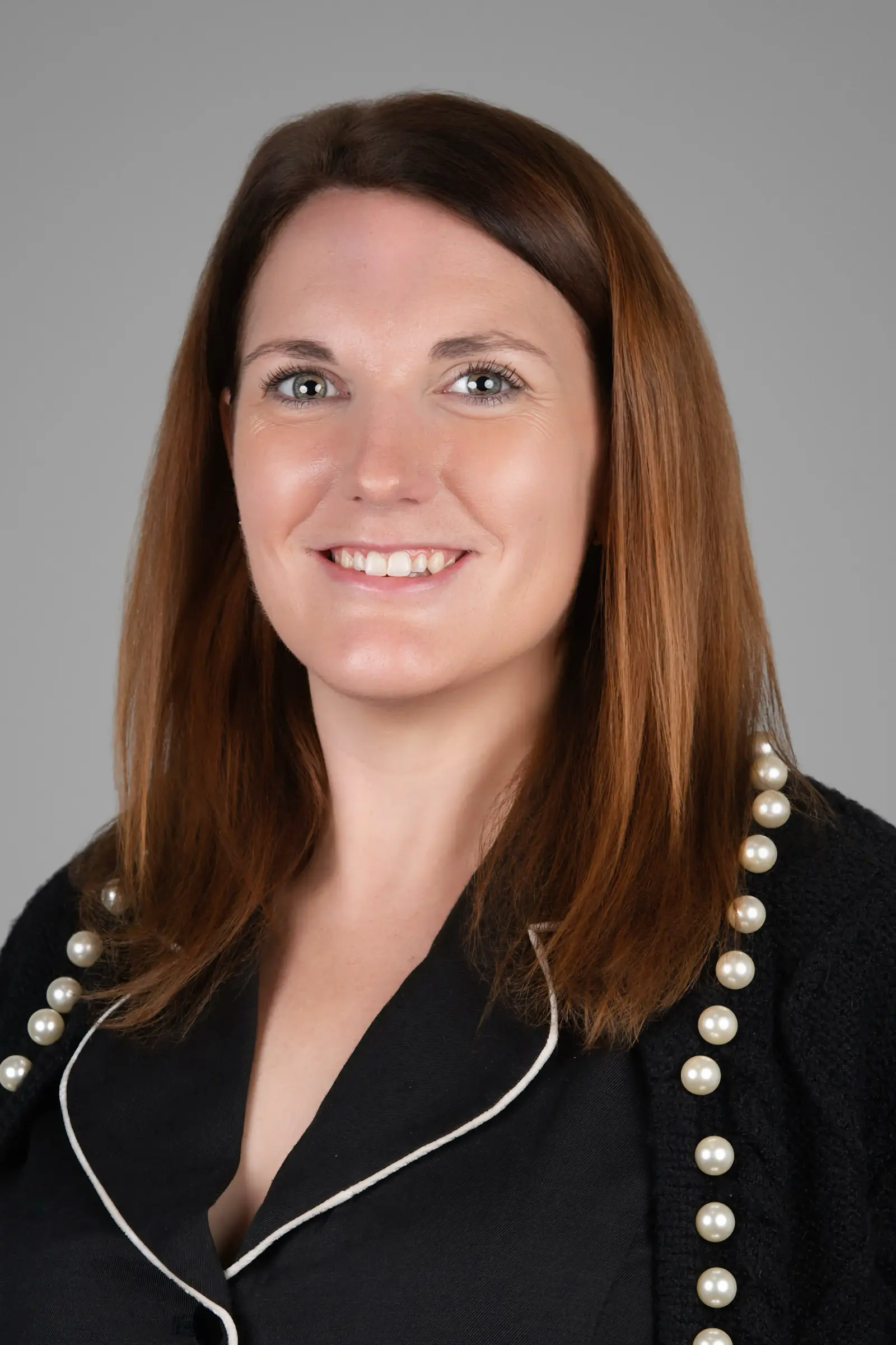 Professional corporate headshot of a female executive as an example of tethered headshot photography