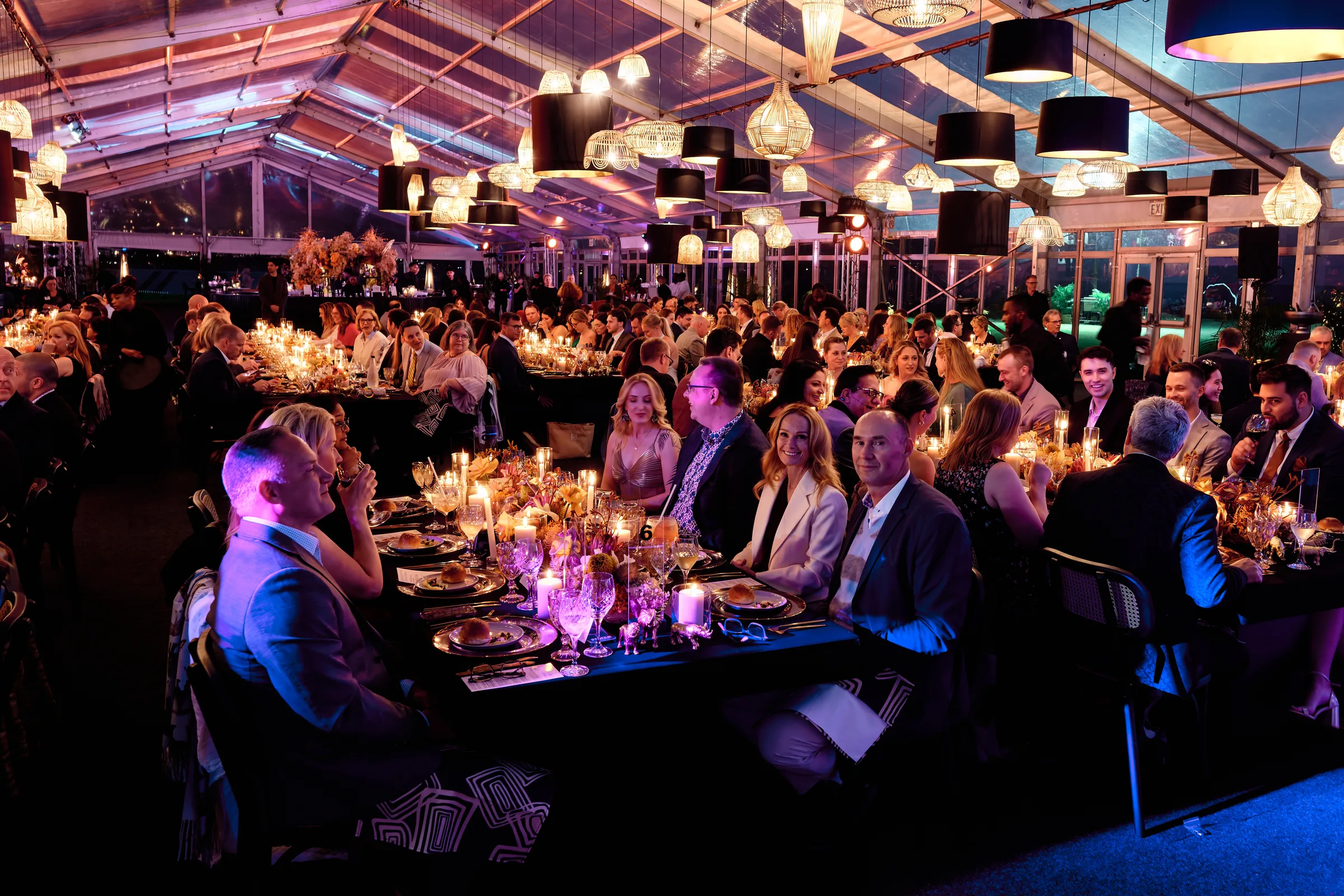 Guests at a gala dinner in a marquee during a Cape Town incentive programme