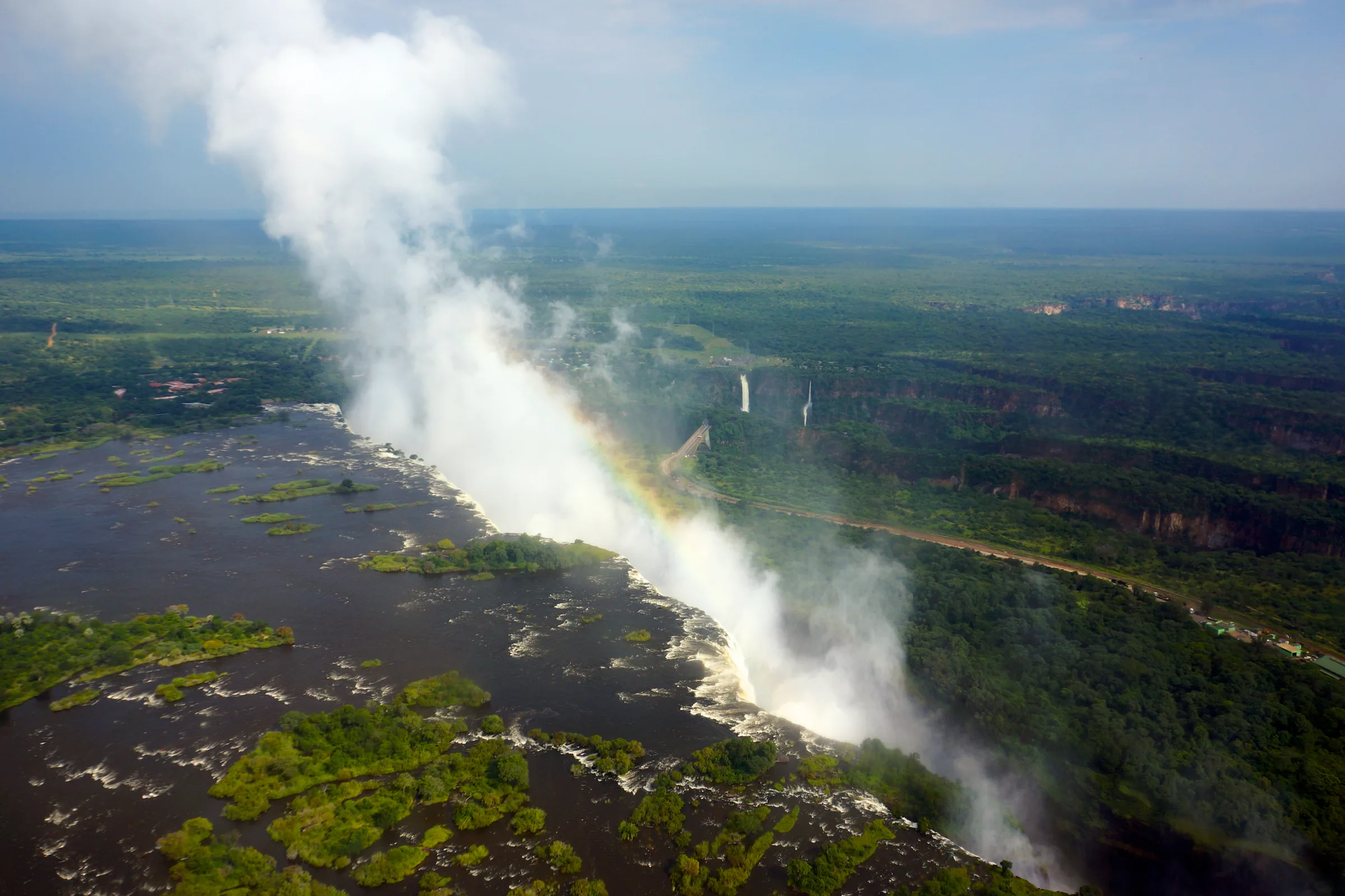 Aerial view of Victoria Falls with a rainbow in the spray, photographed on an incentive programme