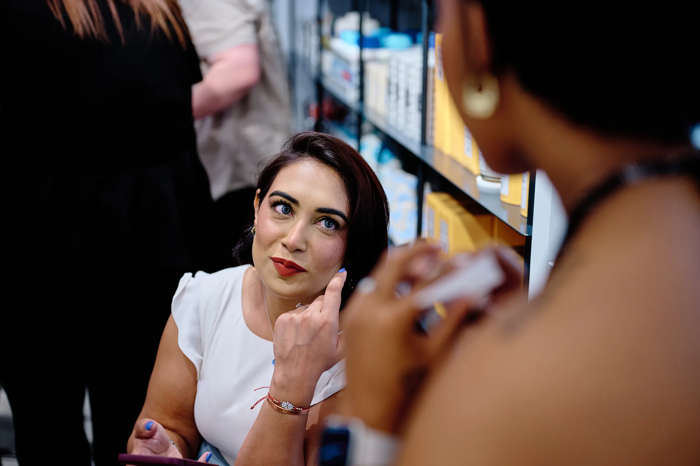 Fragrance being applied to a guest’s wrist at a retail product launch, Cape Town