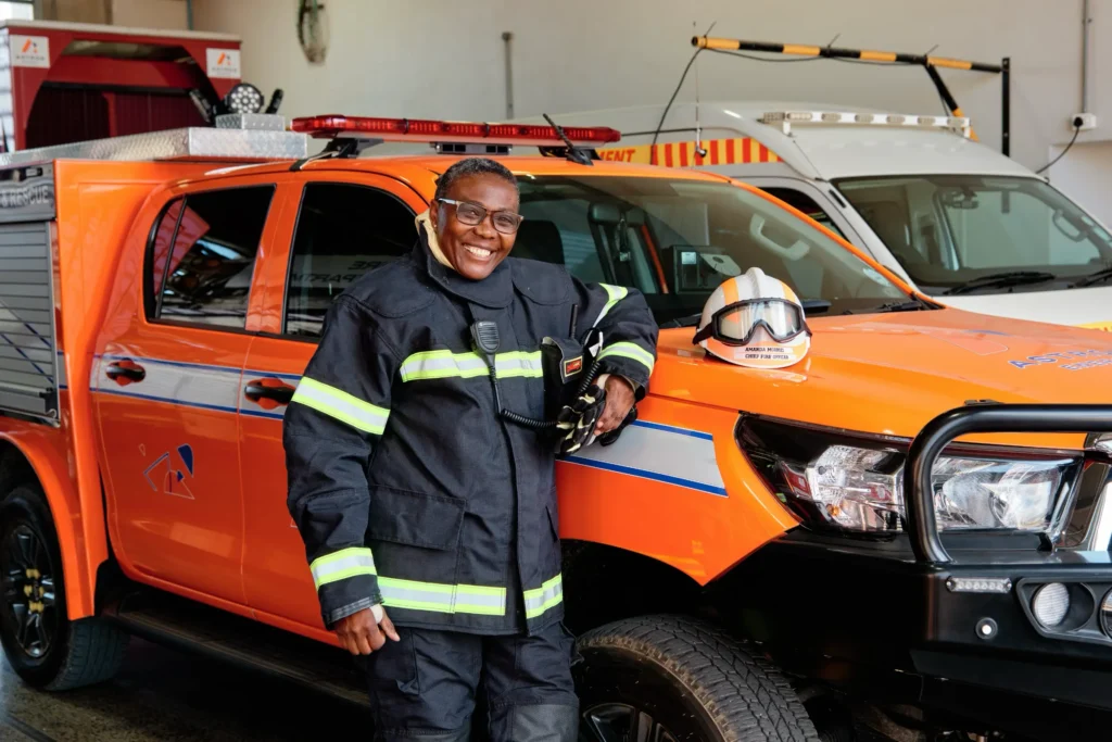 A powerful portrait of the Head of the Fire Brigade at Astron's Cape Town refinery, captured for their Women's Month feature. Commercial photography that showcases leadership.