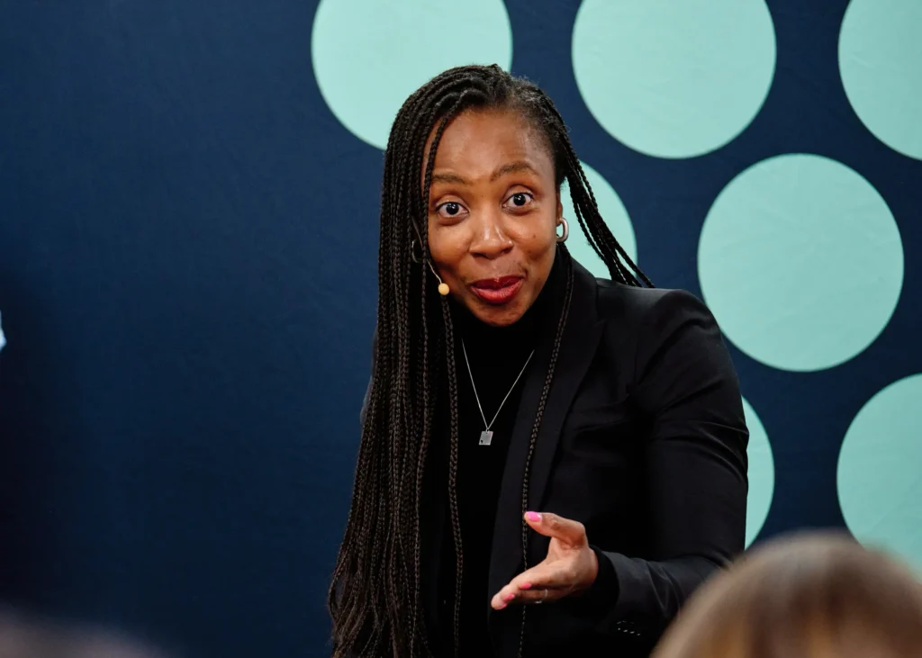 An engaging female speaker captured during a lively plenary discussion in Cape Town. Our corporate event photography captures personality and expertise.