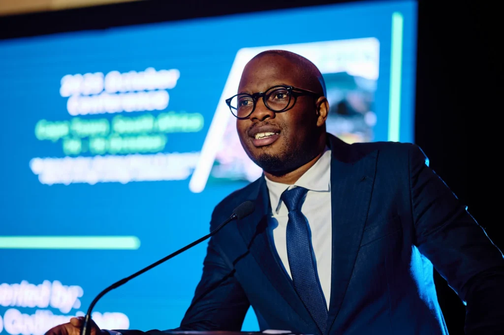 Corporate event photography in Cape Town by Jürgen’s Photography, capturing Deputy Minister Zuko Godlimpi delivering his keynote — authentic moments that reflect your brand’s story.